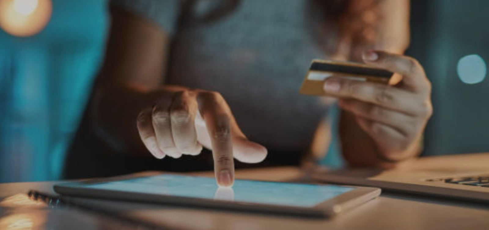 Person using a tablet with a blurred background